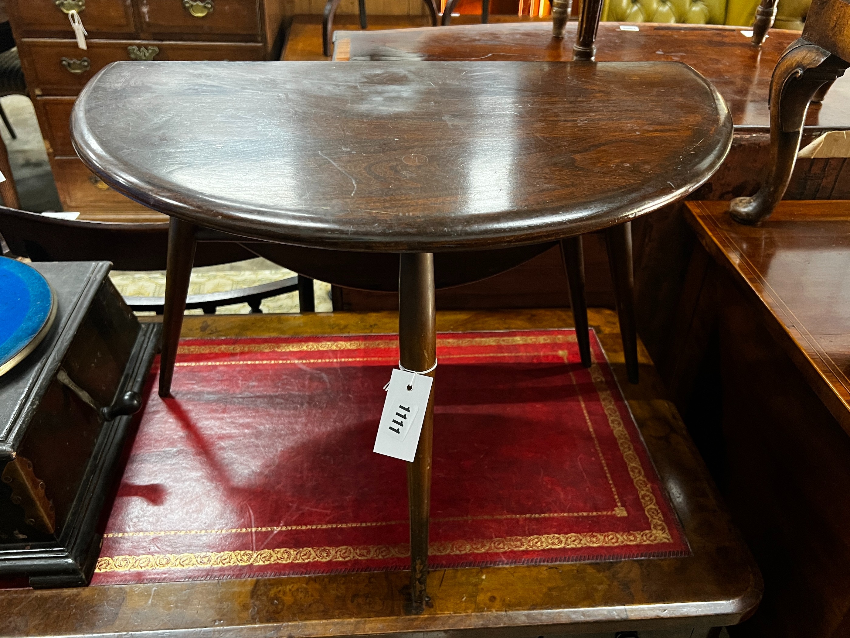 An Ercol elm single drop flap occasional table, width 61cm, height 40cm